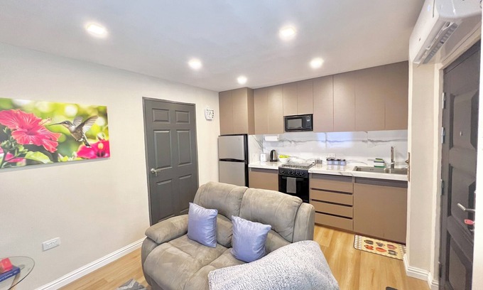 Diego Martin Apartment | Secure, Modern & Peaceful 1 bedroom apartment located in Diego Martin. Relax in a safe, stylish apartment with triple-lock doors, sound-insulated walls, and smart features. Enjoy stunning mountain views just minutes from Port of Spain.