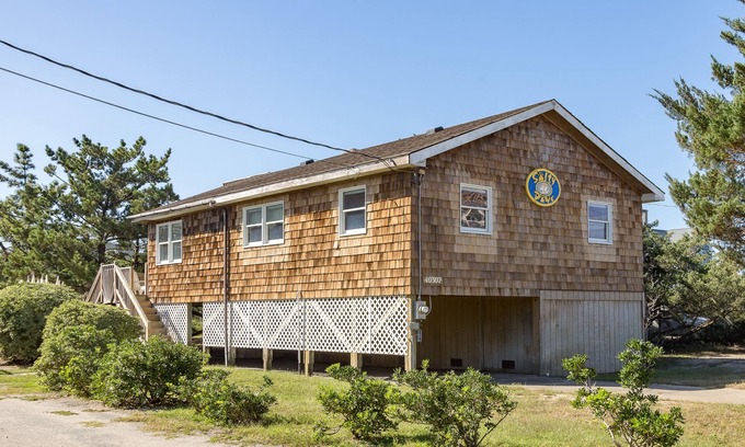 Ocean Isle Estates House | Semi-oceanfront dog-friendly home with private hot tub, decks & shared pool