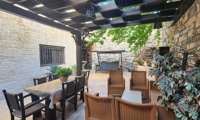 Amman Apartment | Serene 3-bedroom apartment with AC and garden in charming Amman