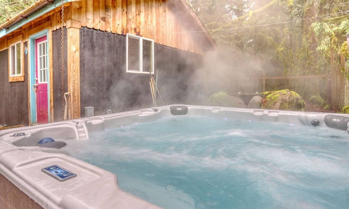 Rhododendron Cabin | Serene Hearthstone Retreat with fireplace, hot tub, BBQ, dog-friendly