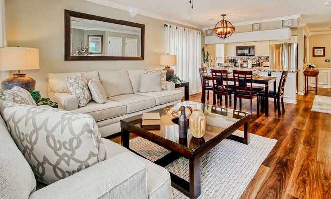 Waterford Plantation Condo | Serene lakefront condo with pool full kitchen, pond and golf course view, & W/D