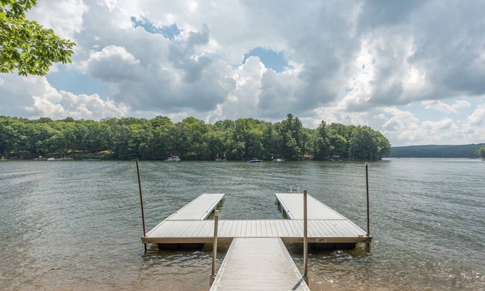 McHenry House | Serene Lakefront Chalet w/Dock Hot Tub & Fire Pit
