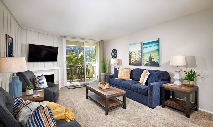 Townsite Condo | Serene NCV Beach Condo with Verdant Gardens & Ocean Glimpses!