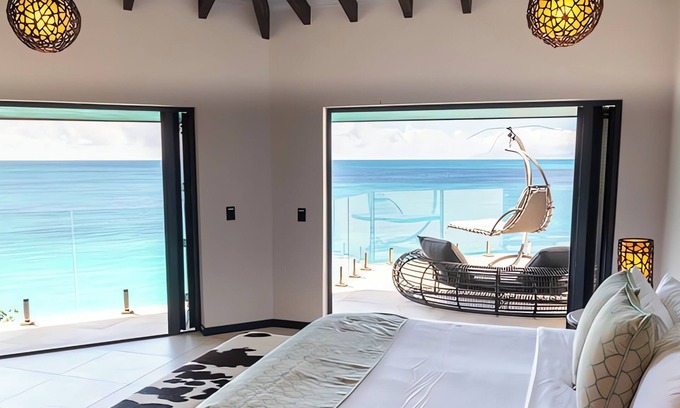 Fryes Beach Hotel | Serene Oceanfront Room w/Stunning Caribbean Sunset Views & Direct Beach Access
