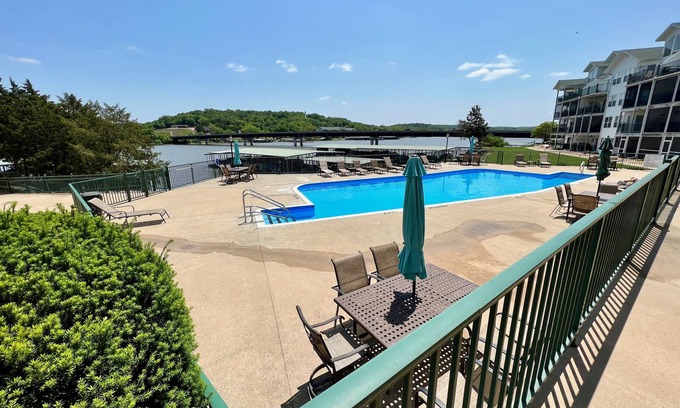 Camdenton Condo | Serene Waterfront Condo! Elevator and 3 onsite pools.