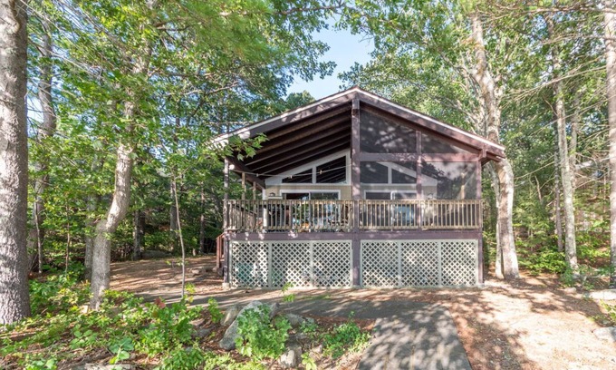Meredith House | Serene Waterfront home overlooking Lake Winnipesaukee with screened porch
