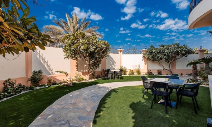 Jumeira 3 Condo | Serengeti Suite at Full Moon Guesthouse – Your Perfect Escape