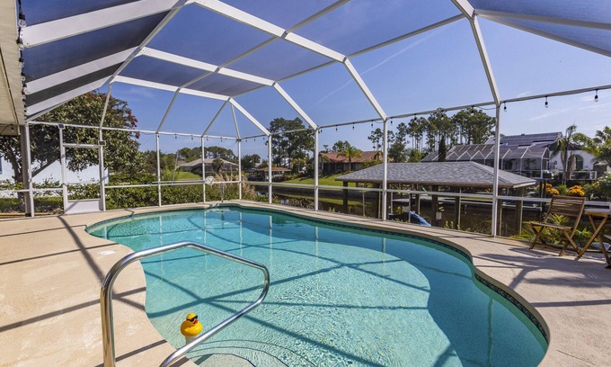 Palm Harbor House | Serenity Waterfront 4BR w/Private Dock, Heated Pool & Relaxing Hot Tub
