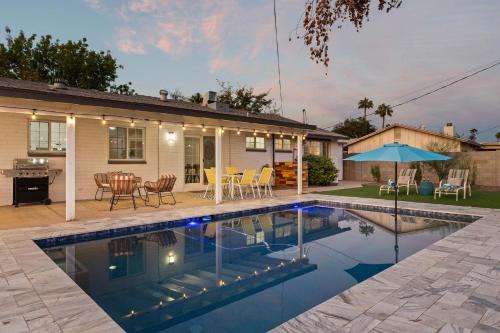Melrose Paradise House | Shangri La Home - Boho Chic with Patio Pool & Grille