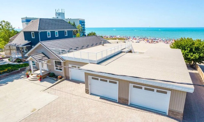 Grand Bend Cottage | Shoreline Palace- 6 bdrm 3 bath, Beachfront, Indoor swim spa, Games Room +morenn