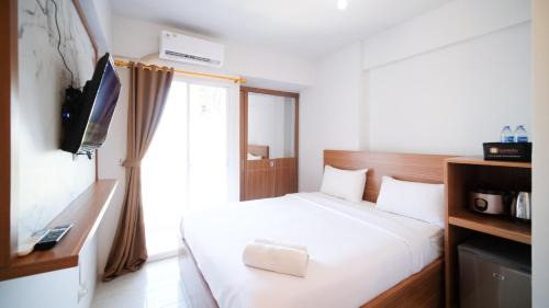 Sidoarjo Apartment | Simple and Comfortable Studio Apartment at Suncity Residence By Travelio