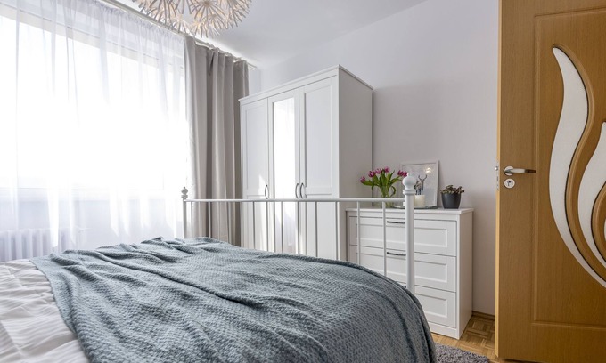 Cluj-Napoca Apartment | Simple white top floor apartment close to old town