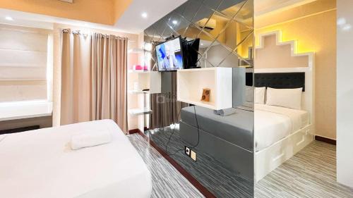 Panakkukang Apartment | Simply and Cozy Living Studio Vida View Makassar Apartment By Travelio