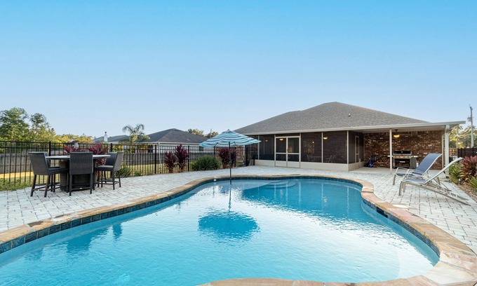 Navarre House | Single-level home with pool, enclosed yard, screened lanai, grill & home office