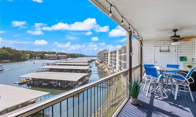 Lakeland Condo | Single-level lake-view condo with dock, outdoor pool, washer/dryer, & central AC
