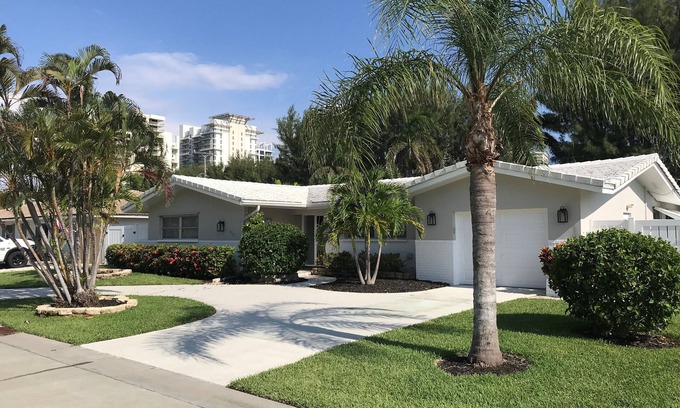 Singer Island House | Single open-concept home one block from the ocean with heated pool and lanai