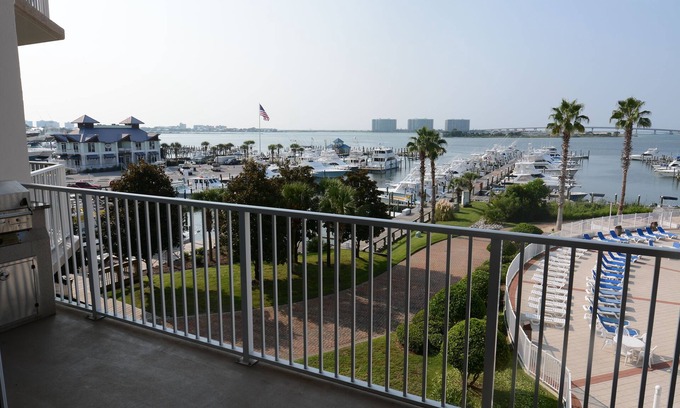 Orange Beach Condo | Sit back and watch the boats pass through on the intercoastal!