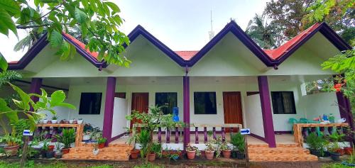 Mambajao House | SJ Pabua Travellers Inn