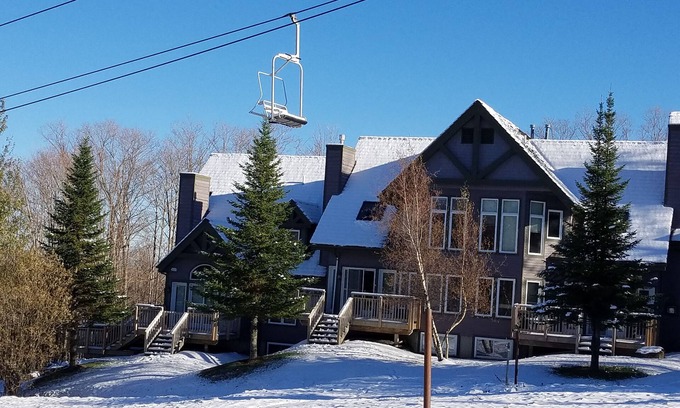 North Troy House | Ski in/out 4 BR townhome directly on Raccoon Run and the Village Chair Lift !