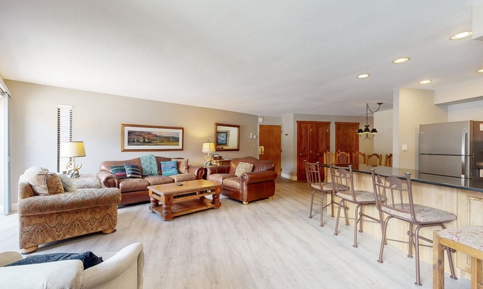 Historic District Condo | Ski-in/out condo with fireplace & hot tub & grill- steps to lifts/town