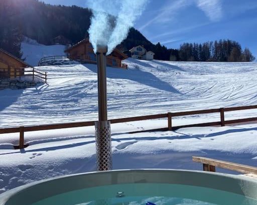 Saint-Pierre-de-Clages Ski Chalet | Ski in out Swiss Alps Chalet Charelle by Jolidi