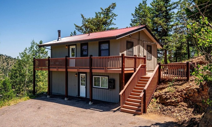 Evergreen House | Sky Mountain Retreat. Escape to the serene winter beauty of Evergreen, Colorado