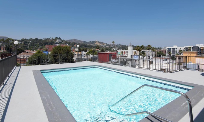 Little Armenia Apartment | Snazzy 1-Bed Apartment with Rooftop Pool & Hollywood Sign View