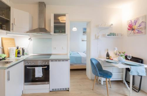 Munchen District Apartment | Sonnige, ruhige Gartenwohnung mit Terrasse u. Garten