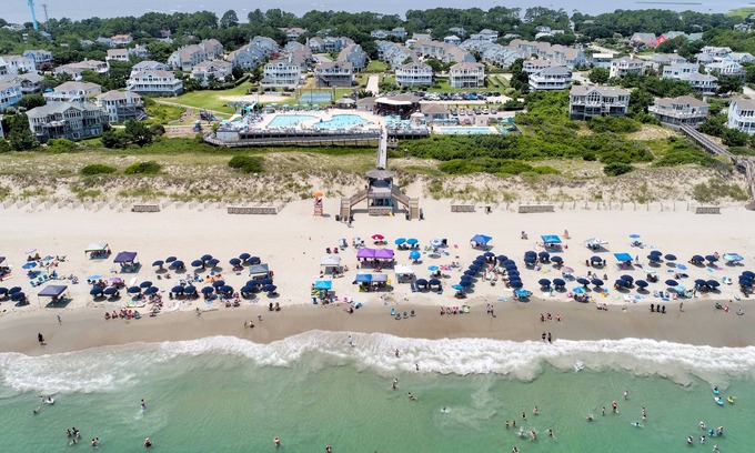 Corolla Light House | Sound-side condo with private pool, hot tub, & rec room with pool table
