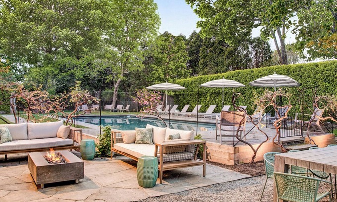 Village of Southampton Hotel | Southampton estate with oversized pool, chefs kitchen, vast lawn,.