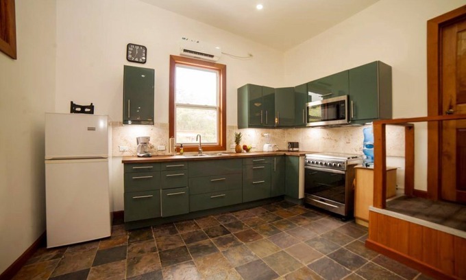 Carenero Island Apartment | Spacious 4BR, 4BA with AC near top surf spots. Family friendly!