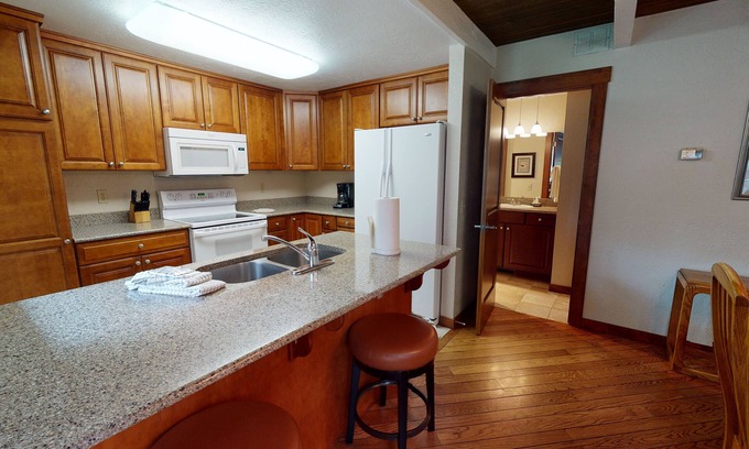 Tennis Village Condo | Spa-Side Escape with A/C, Fireplace and BBQ