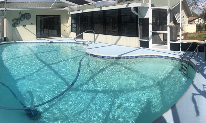 Indian Waters House | Spacious 3 BR 2 Bath House On Deep Canal With Screened Heated Pool