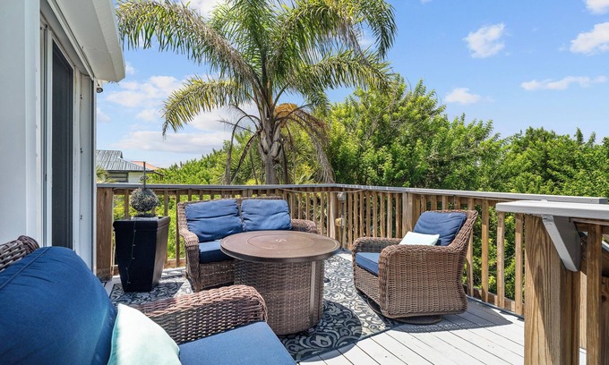 New Smyrna Beach House | Spacious 3BR, 2BA beach home just a short walk from the sand! Three bedrooms up, private queen room and bath down. Secure 2-car garage for vehicles or a small boat. Perfect for families or groups. 30-day minimum stay required.