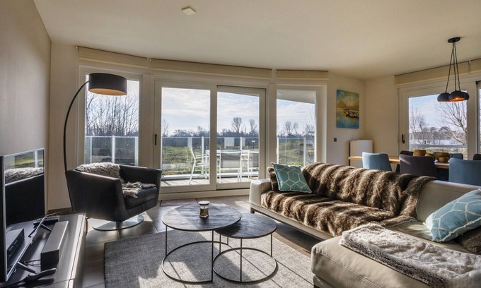 Koksijde-Bad Apartment | Spacious apartment with mill views in Koksijde