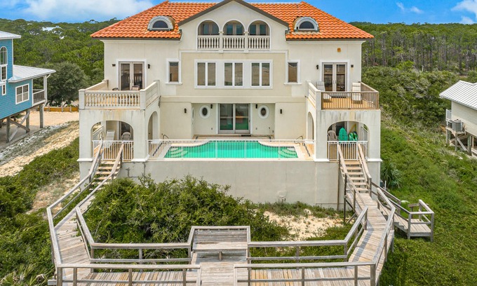 Sea Palm Village House | Spacious beachfront home with private pool, elevator, boardwalk & on-site pools