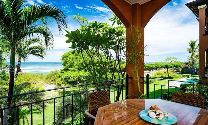 Playa Langosta Villa | Spacious beachfront 2-BR condo with Pool and a stunning sunset view