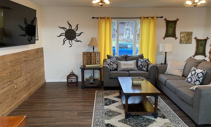 Quad Cities House | Spacious family home with luxe beds, fenced in back yard, heart of town!
