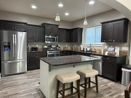 Meridian House | Spacious Family Retreat with Hot Tub & Home Theater