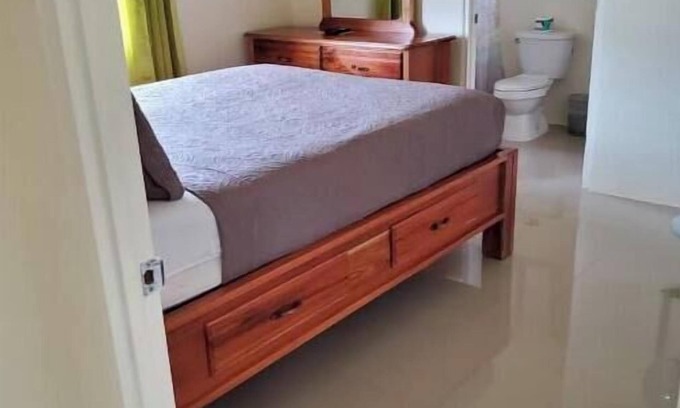 Falmouth House | Spacious two bedroom home with ocean view, pool and tennis court.