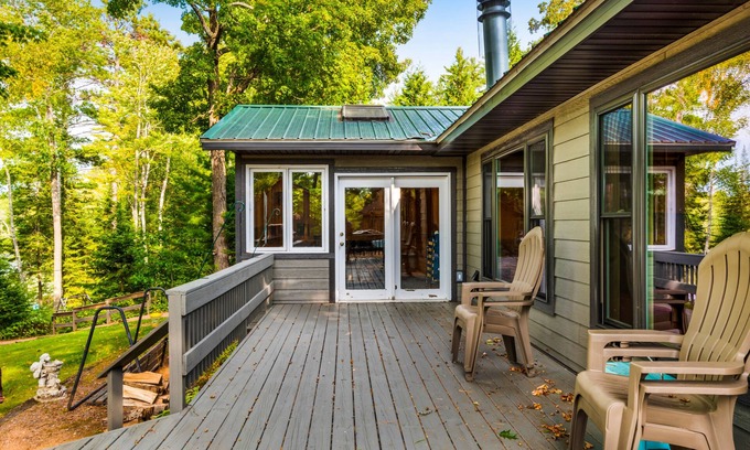Presque Isle Cabin | Spacious lakefront lodge with fireplaces, WiFi, W/D, dock, & resort game room