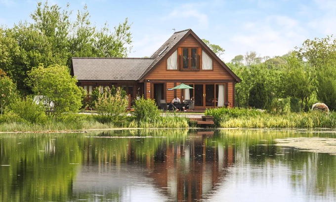 Menai Bridge Ski Chalet | Spacious, light, all wood luxury lodge in tranquil location at head of lake.