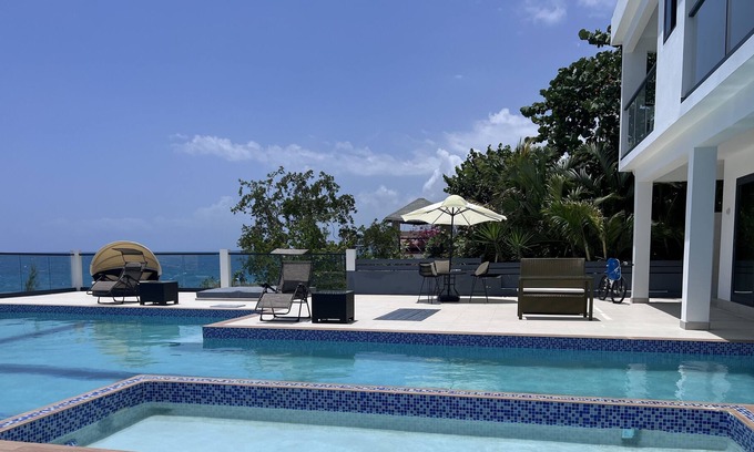 Whitehouse Villa | Spacious, modern, luxury group getaway overlooking Caribbean Sea