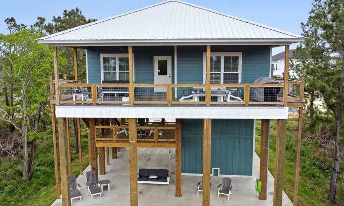 Shoreline Park House | Spacious new 4-bedroom house on a deep water canal in tranquil Bay St. Louis, MS