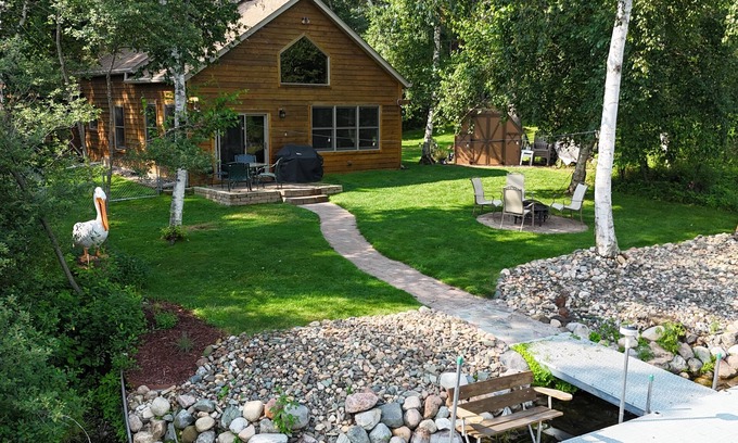 Breezy Point House | Spacious Summer Escape: Private Backyard, Dock & Fire Pit, Channel Waterfront
