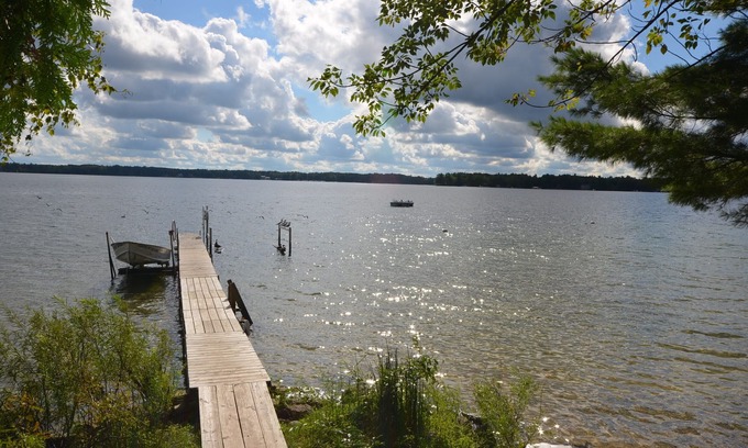 Traverse City Cabin | Spacious, waterfront cottage in Traverse City. Fireplace. Pet friendly.