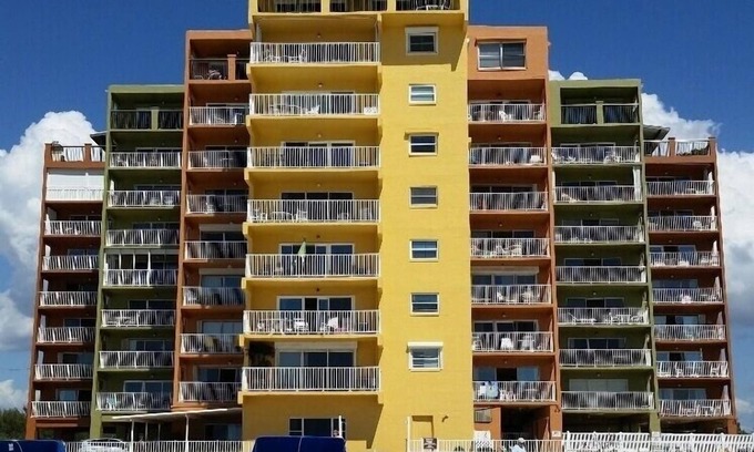 Indian Shores Condo | Spacious white sandy beach side condo with intercoastal water view
