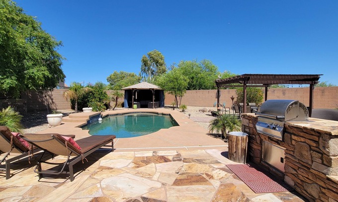 Surprise Farms House | Spectacular oasis with private pool, large yard, & game room