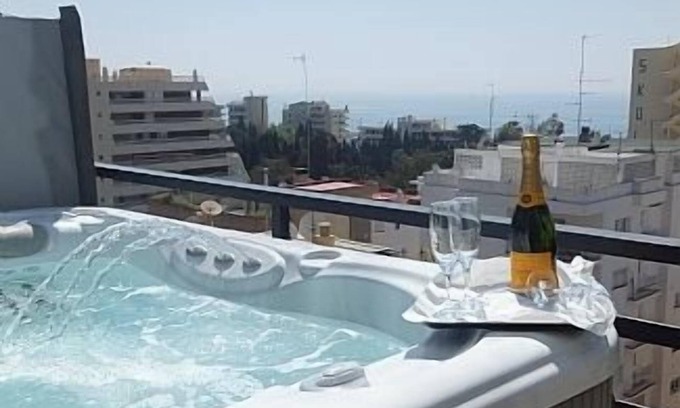 Marbella City Centre Apartment | Spectacular Penthouse with Hot Tub, Wrap Around Terrace, Sea and Mountain Views.