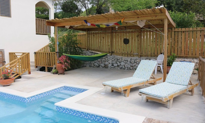 Treasure Beach Villa | Spectacular views of the Caribbean Sea await you in this bright, airy home.